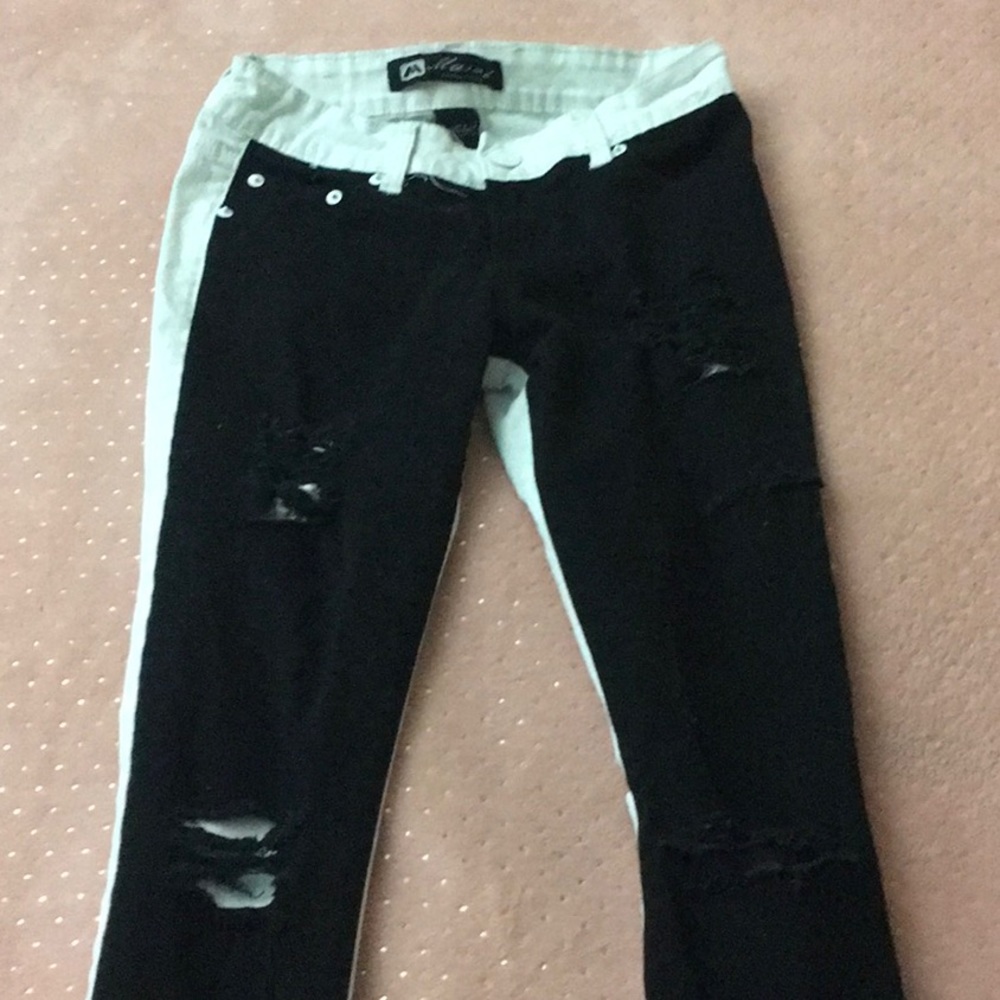 Black and white dual colored ripped jeans